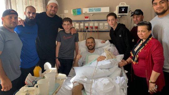 Richmond footballer Bachar Houli (2nd left) and New Zealand rugby player Sonny Bill Williams visit victims of the Christchurch massacre in hospital. 