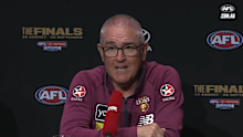 Brisbane coach Chris Fagan speaks at the grand final parade.