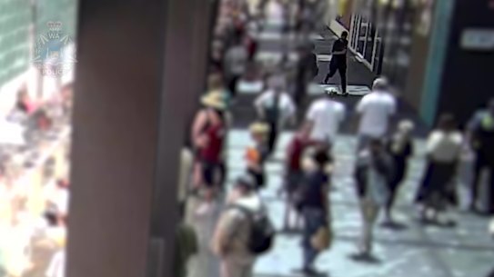 Police released grainy video of the suspect hurling something towards the crowd in Perth on January 26.