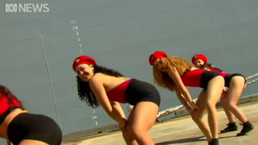 The 101 Doll Squadron performs a twerking routine at the launch of the navy’s latest ship, HMAS Supply, in Sydney.