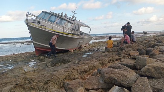 Australian Border Force put the men on two boats and turned them back to Indonesia without maps or GPS. This one ran aground on rocks on Rote Island. 