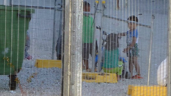 Children playing near the Refugee Processing Centre on Nauru.