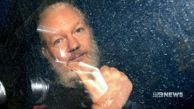 Julian Assange is driven away from the Ecuadorian embassy in London after his arrest.