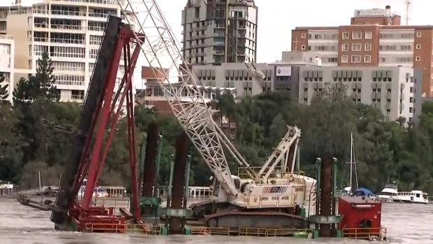 Howard Smith Wharves was evacuated after a loose pontoon with a crane on it moved down Brisbane river. 