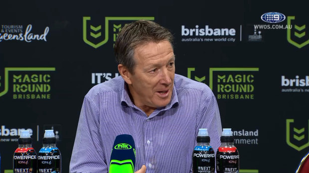 Rout: Craig Bellamy in a brighter mood after the Storm's thrashing of Parramatta in Brisbane.