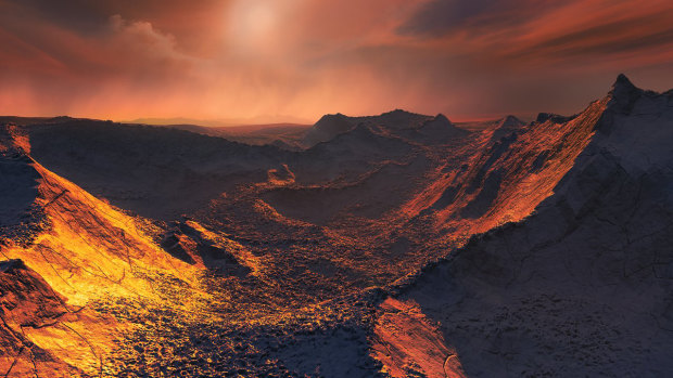 An artist's impression of the view from the surface of a frozen and dimly lit planet, dubbed a "Super-Earth", orbiting Barnard's Star, which is just six light years from  our solar system. 