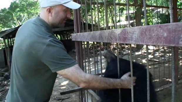 Nigel Grier with one of the captive bears in Mu Aye Pu.