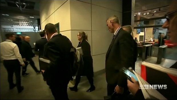 Federal police raiding the ABC headquarters in Sydney in 2019.