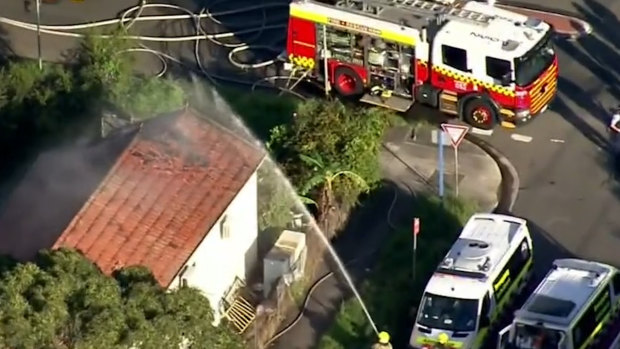 Woman dead, teens pulled from house fire in Sydney’s south-west