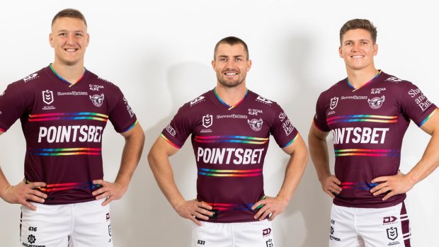 Sean Keppie, Kieran Foran and Reuben Garrick model the rainbow jersey.