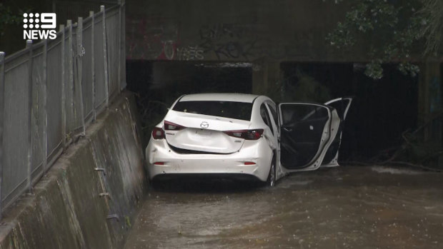 A Mazda 3 in the canal where two bodies were found by police during a search on Tuesday. 