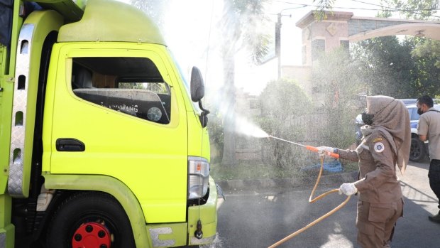 A livestock truck being sprayed with disinfectant at Lembar port, West Lombok, in the province directly east of Bali.
