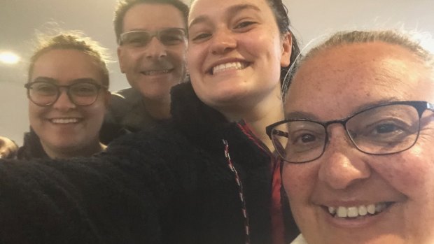 Sarah Krieg, third from left, with, from left, her sibling Ems and parents Michael and Michelle in Albury in July last year before the NSW-Victorian border was shut.