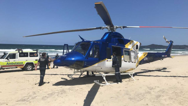 A teenager enjoying his schoolies week was reportedly caught in a rip and almost drowned on the Sunshine Coast.