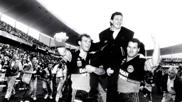 Champions: The Panthers celebrate victory over the Raiders in the 1991 grand final.