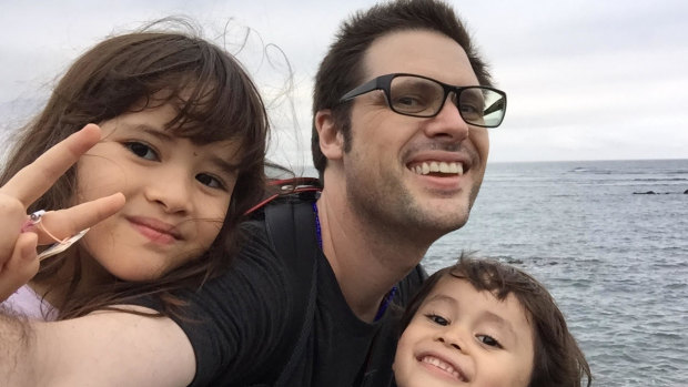 Freelance journalist Scott McIntyre with his two children in Japan.