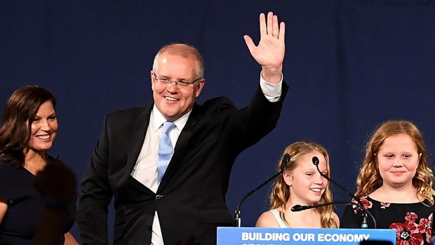 Triumph: Scott Morrison, with wife Jenny and children Lily and Abbey.