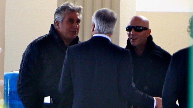Spink, left, and Stephen Beves, right, at the funeral of underworld figure Norm Beves in 2011.