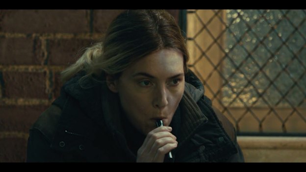 Kate Winslet as Detective Sergeant Mare Sheehan vapes in the crime drama, Mare of Easttown.