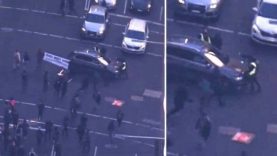 A car has driven through a protest in Sydney’s CBD 