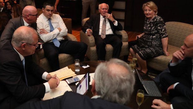 Waiting for Shorten to concede from left: Scott Morrison, chief of staff John Kunkel, campaign director Andrew Hirst, John and Janette Howard, head of media Andrew Carswell.