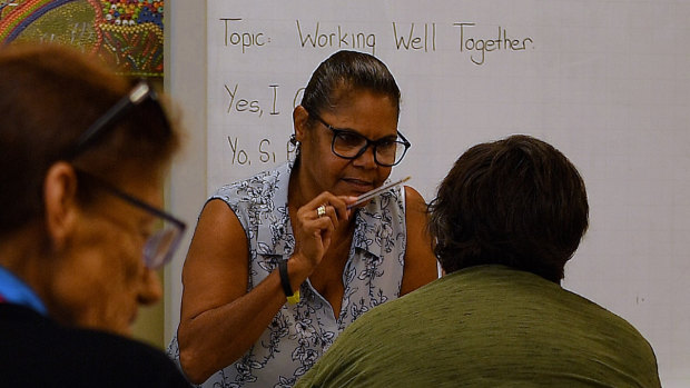 Judy McGuinness of the Yes I Can Campaign runs an adult literacy class in Airds, NSW, in 2019.