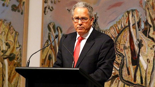 Peter Carne, pictured in 2014 while speaking at the memorial service for former premier Wayne Goss.