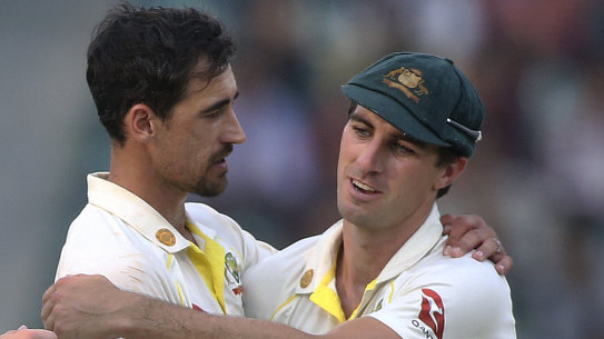 Mitchell Starc with Pat Cummins.