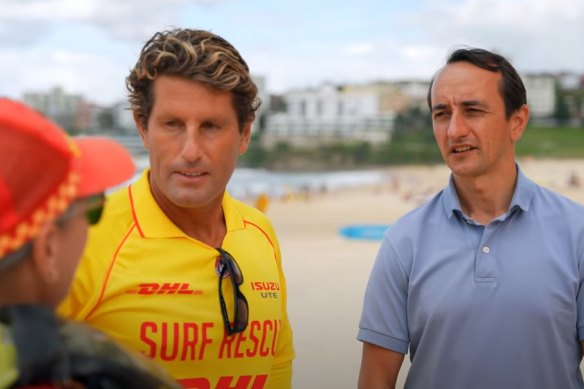 Bondi Rescue lifesaver Anthony Carroll in an ad for Wentworth Liberal MP Dave Sharma. Surf Life Saving NSW said the Sharma and Falinski ads had led it to issue a warning.