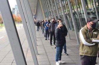 Queues at the Melbourne Convention Centre on Saturday morning.