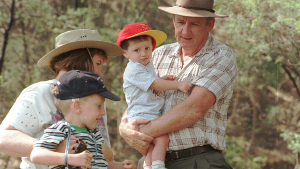 Tim Fischer with his wife Judy Brewer and sons Harrison and Dominic on the old Wagga to Tumbarumba railway line, 1998. 