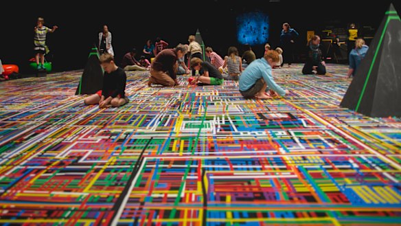 Drawing on Complexity: Experiment 9 is an immersive installation where artist Briony Barr invites people to take part with coloured tape.