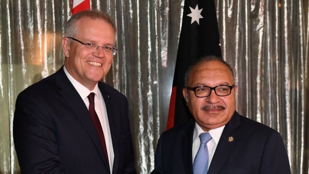 Prime Minister Scott Morrison greets Prime Minister of Papua New Guinea Peter O'Neill ahead of talks on defence and law enforcement in Sydney, last year.