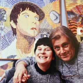 Artists Pat and Richard Larter in front of one of his portraits of her.