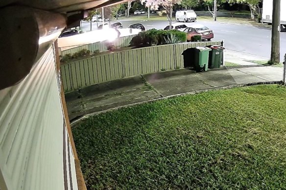 Flames quickly engulf the front yard.