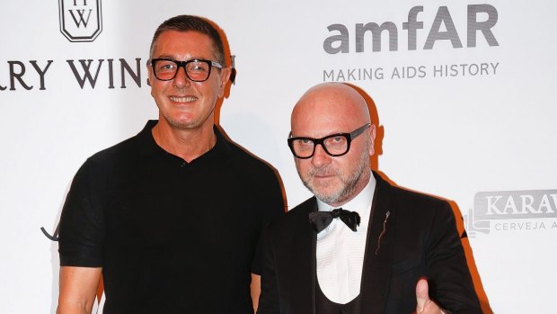 Italian fashion designers Domenico Dolce, right, and Stefano Gabbana say their company's Instagram account was hacked.