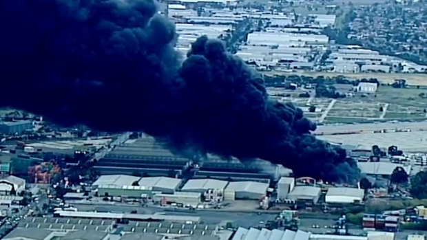 The warehouse fire sent plumes of black smoke across Melbourne's western suburbs.