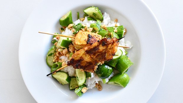Satay chicken with cucumber salad and coconut rice is easy yet impressive.