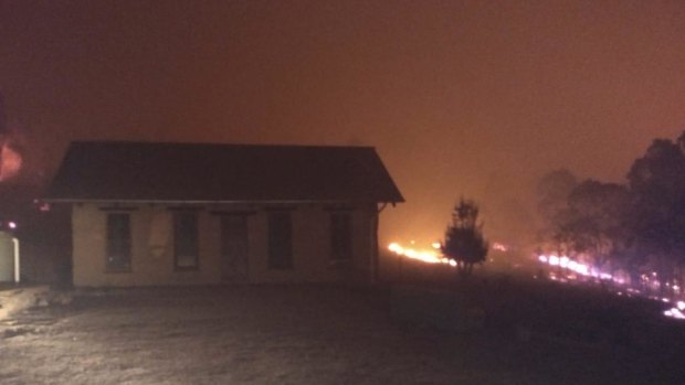 The fires edging towards Richard Glover's bush house.
