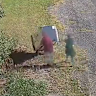 CCTV images of a couple allegedly dumping a fridge in Brisbane. 