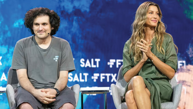 Schlubby mystique: Sam Bankman-Fried next to supermodel Gisele Bündchen at the Crypto Bahamas conference in Nassau in April.