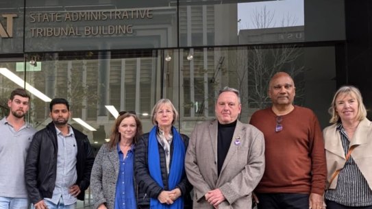 Nicheliving clients outside the State Administrative Tribunal on Wednesday after the marathon hearing.