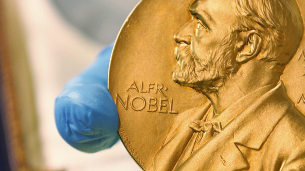 A gold Nobel Prize medal. 