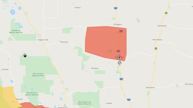 Residents of Mogumba have been warned to stay at home and prepare to survive as bushfire bears down on their community