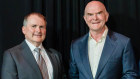 Outgoing EY Port Jackson Partners managing directer Byron Pirola and new leader Chris Paxton.