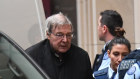 George Pell arrives at court for a second day.