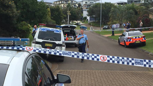 Police cordon off the quiet cul-de-sac Beacon Court after a man was allegedly stabbed. 