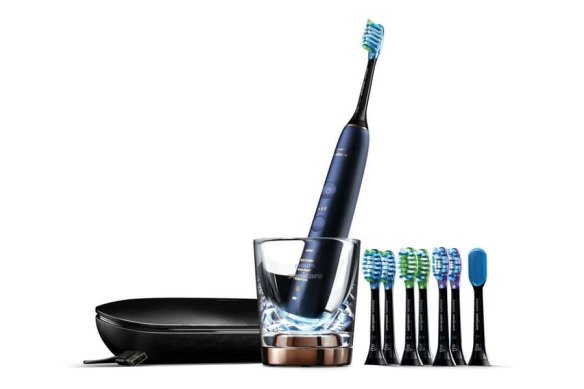 The Philips Sonicare 9700 DiamondClean charges in a glass and looks a bit nicer than the Oral-B.