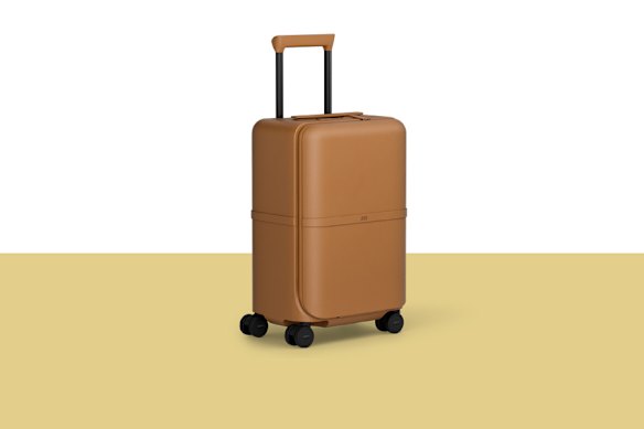 July “Capsule Carry On Pro” suitcase.