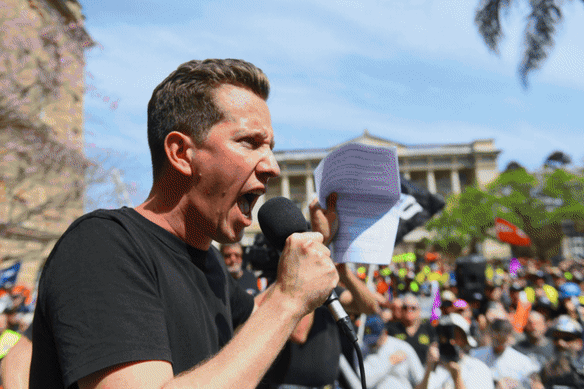 Federal Greens MP Max Chandler-Mather spoke in support of the CFMEU at the Brisbane rally.